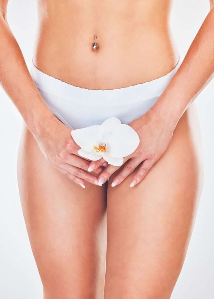 Health, body care and feminine hygiene with flower in hands, woman in fresh and clean feeling. Flor